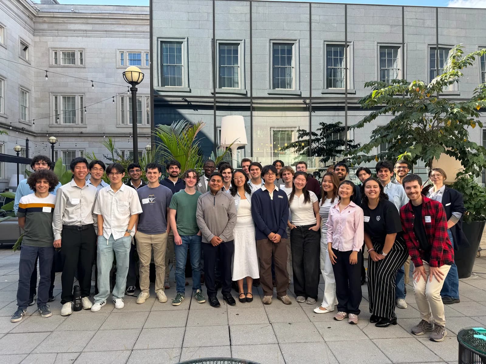 CAIA members with other student attendees of the AI safety roundtable in a courtyard in Washington, DC